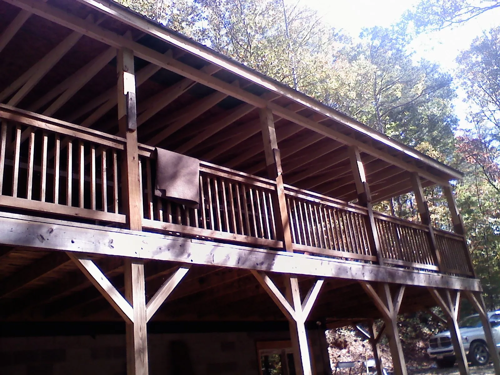 Timber framing under a new elevated porch and deck — Roof Leak Repair in Wilmerding by Roofing Brothers